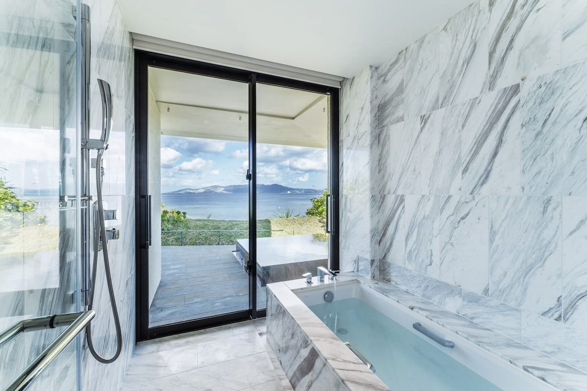 cliff villa with private pool, natural hot spring and lounge access included | bathroom | separate bathtub and shower, rainfall showerhead, free toiletries