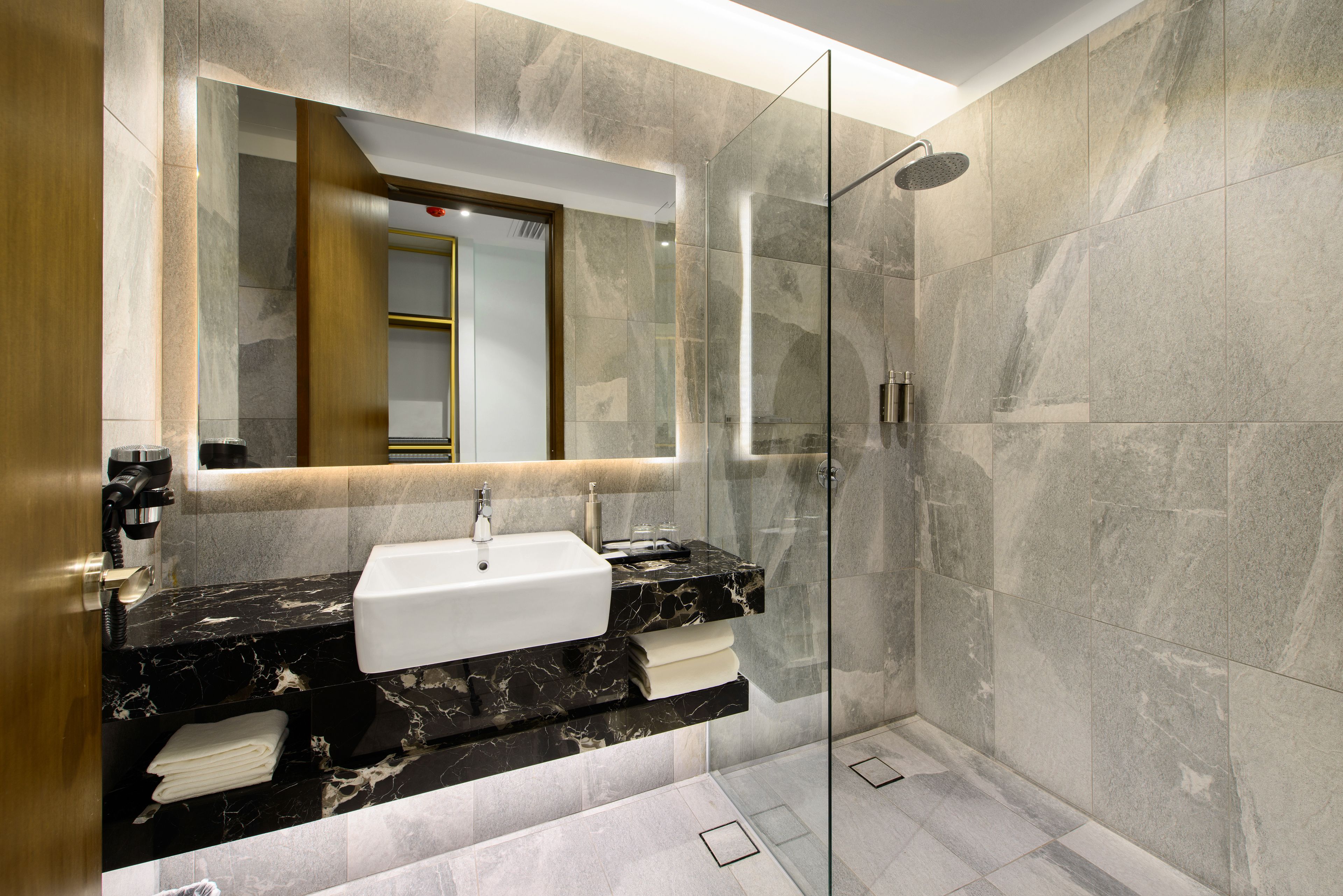 superior room | bathroom | shower, rainfall showerhead, free toiletries, hair dryer