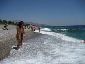 Platja a a prop, gandules de platja i tovalloles de platja 