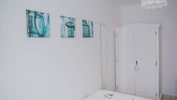 1 dormitorio, tabla de planchar con plancha, wifi gratis y ropa de cama