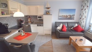 Coffee/tea maker, fridge, microwave, oven