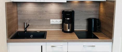 Fridge, microwave, stovetop, coffee/tea maker