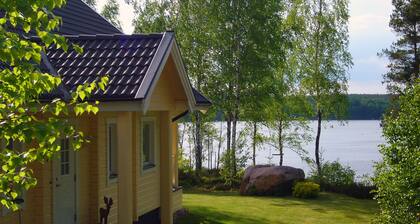 Idylli järven rannalla, ylelliset varusteet - sauna, vene, WiFi