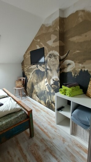 1 chambre, fer et planche à repasser, Wi-Fi gratuit, draps fournis