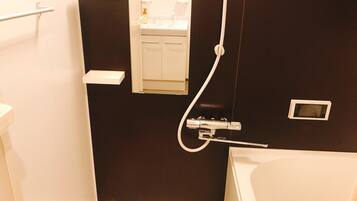Separate bathtub and shower, free toiletries, hair dryer
