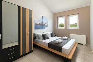 4 chambres, chambres insonorisées, fer et planche à repasser