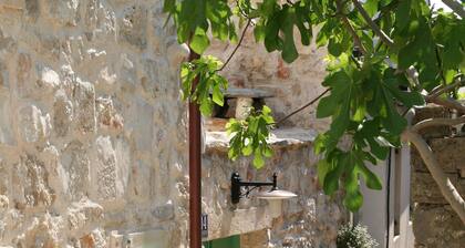 Lovingly renovated stone house with courtyard & brick barbecue area