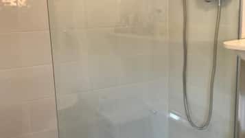 Bathtub, hair dryer, towels