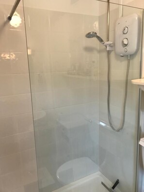 Bathtub, hair dryer, towels