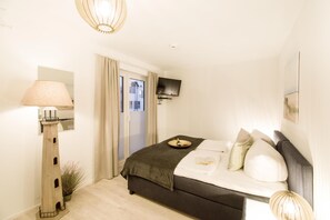 2 slaapkamers, een strijkplank/strijkijzer, reisbedje, gratis wifi