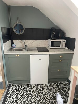 Fridge, microwave, cookware/dishes/utensils