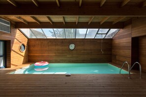 Alberca techada y alberca climatizada