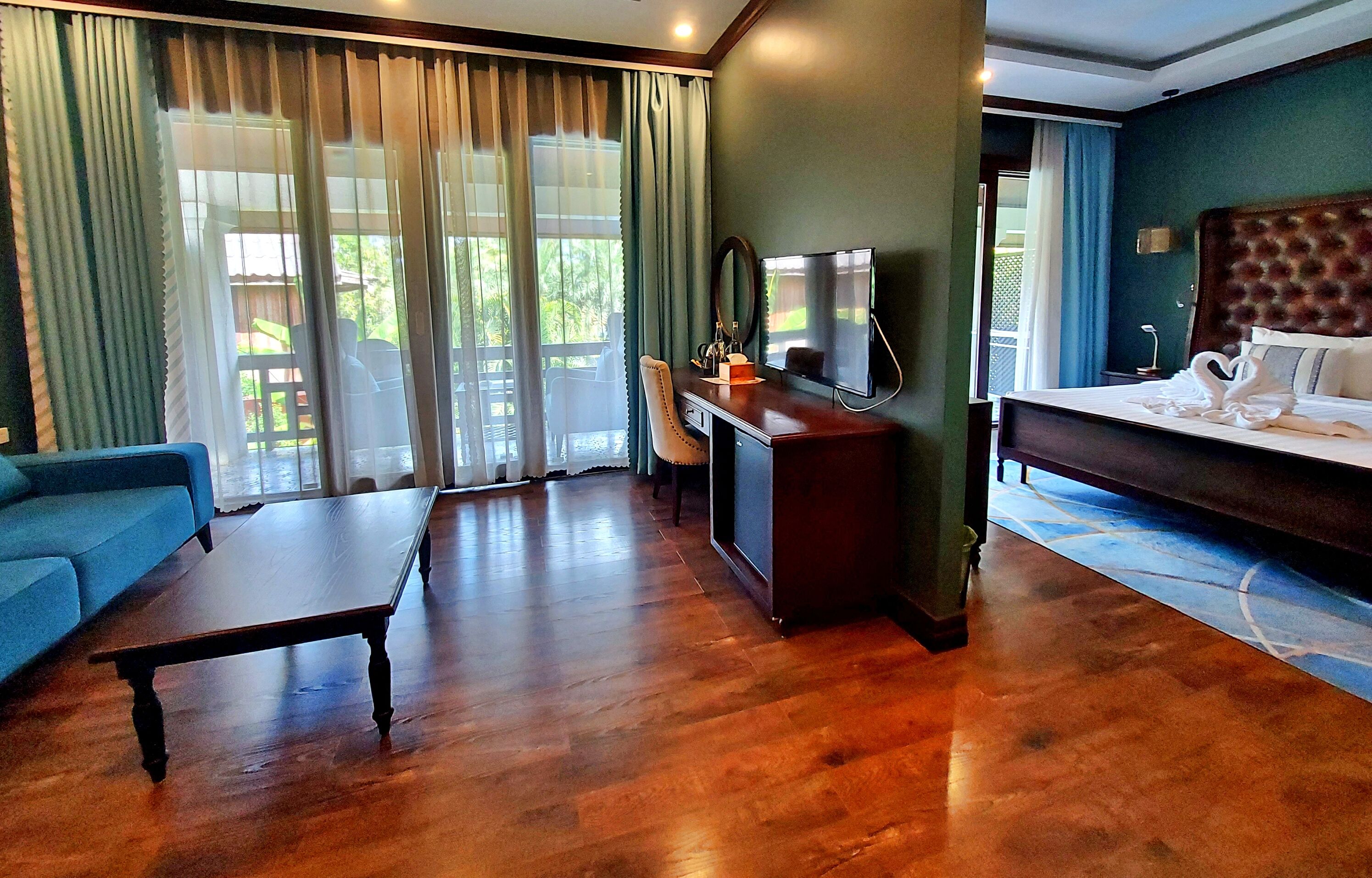 luxury double room, 1 king bed, pool view | in-room safe, desk, blackout curtains, soundproofing