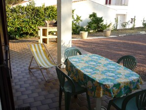 Outdoor dining - House 2⭐️ with terrace and garden-Parking & pets-Bike paths and beaches (Le Grand-Village-Plage)