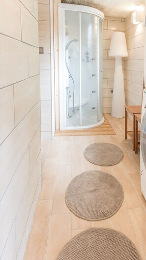 Shower, hair dryer, towels, soap