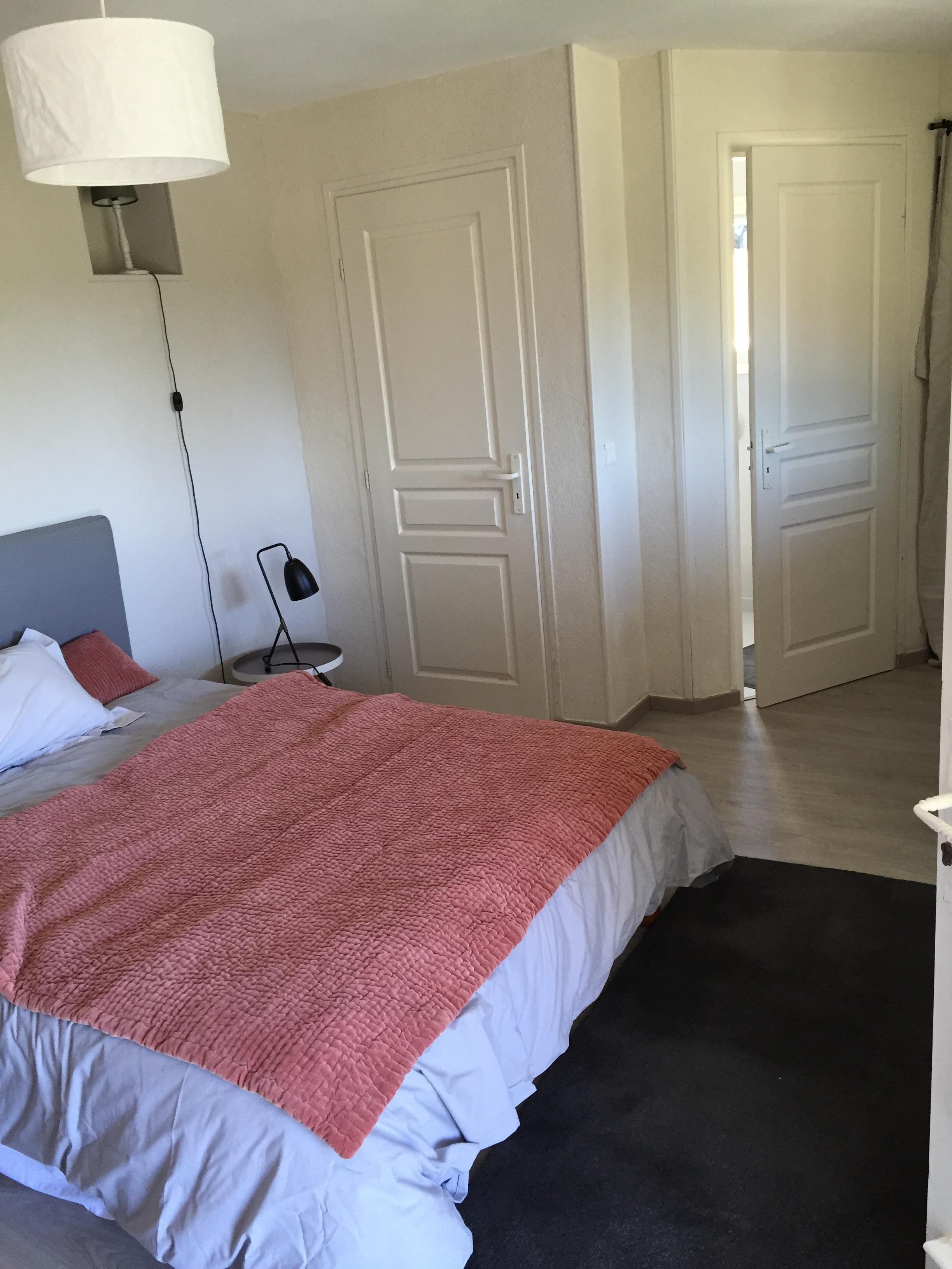 House with swimming pool surrounded by nature 