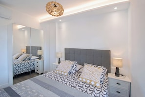 2 dormitorios, tabla de planchar con plancha, wifi gratis y ropa de cama