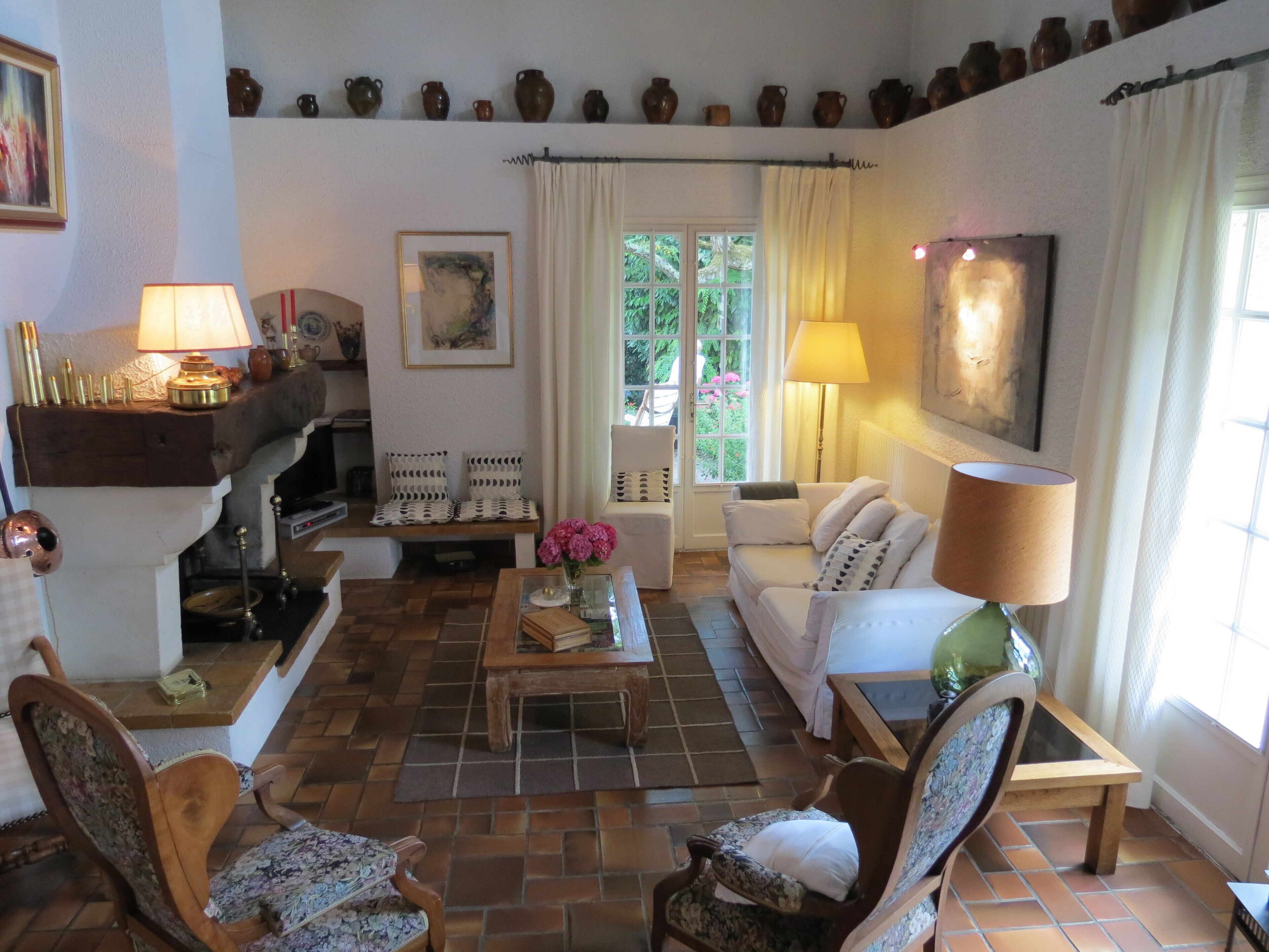 Charming stone house in a park with trees on the hillsides of Bordeaux