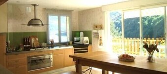 Lovely village house with a view of lake and mountain VAUJANY on the other side Alpe d'Huez