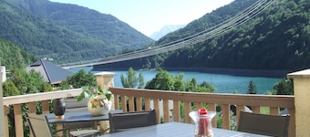 Lovely village house with a view of lake and mountain VAUJANY on the other side Alpe d'Huez
