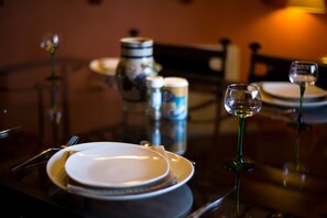 Enjoy a meal at this beautifully set dining table.