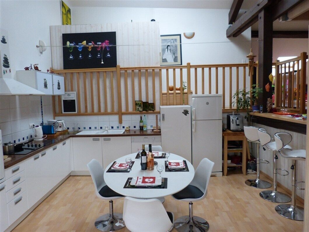 Loft 130 m² - quiet in the city center - shared garden - WiFi
