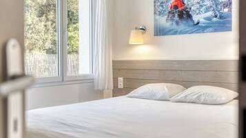 2 slaapkamers, een strijkplank/strijkijzer, reisbedje, wifi