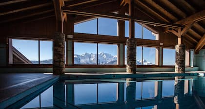 GRAND DUPLEX 120 M2 DANS CHALET STANDING MGM AVEC PISCINE CHAUFFEE 4 ****