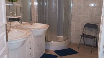 Shower, eco-friendly toiletries, hair dryer, soap
