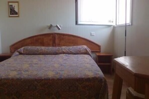 2 dormitorios, caja fuerte, tabla de planchar con plancha