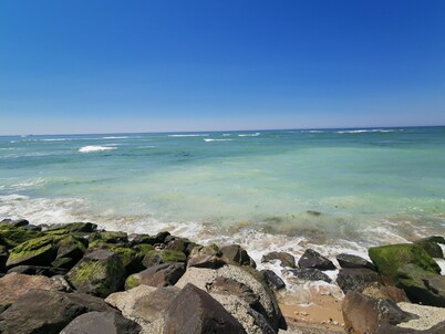 Bright house near the sea. Lovely decor, large enclosed garden.  Car parking