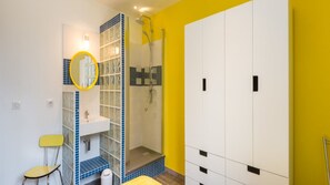Bathtub, hair dryer, towels, soap
