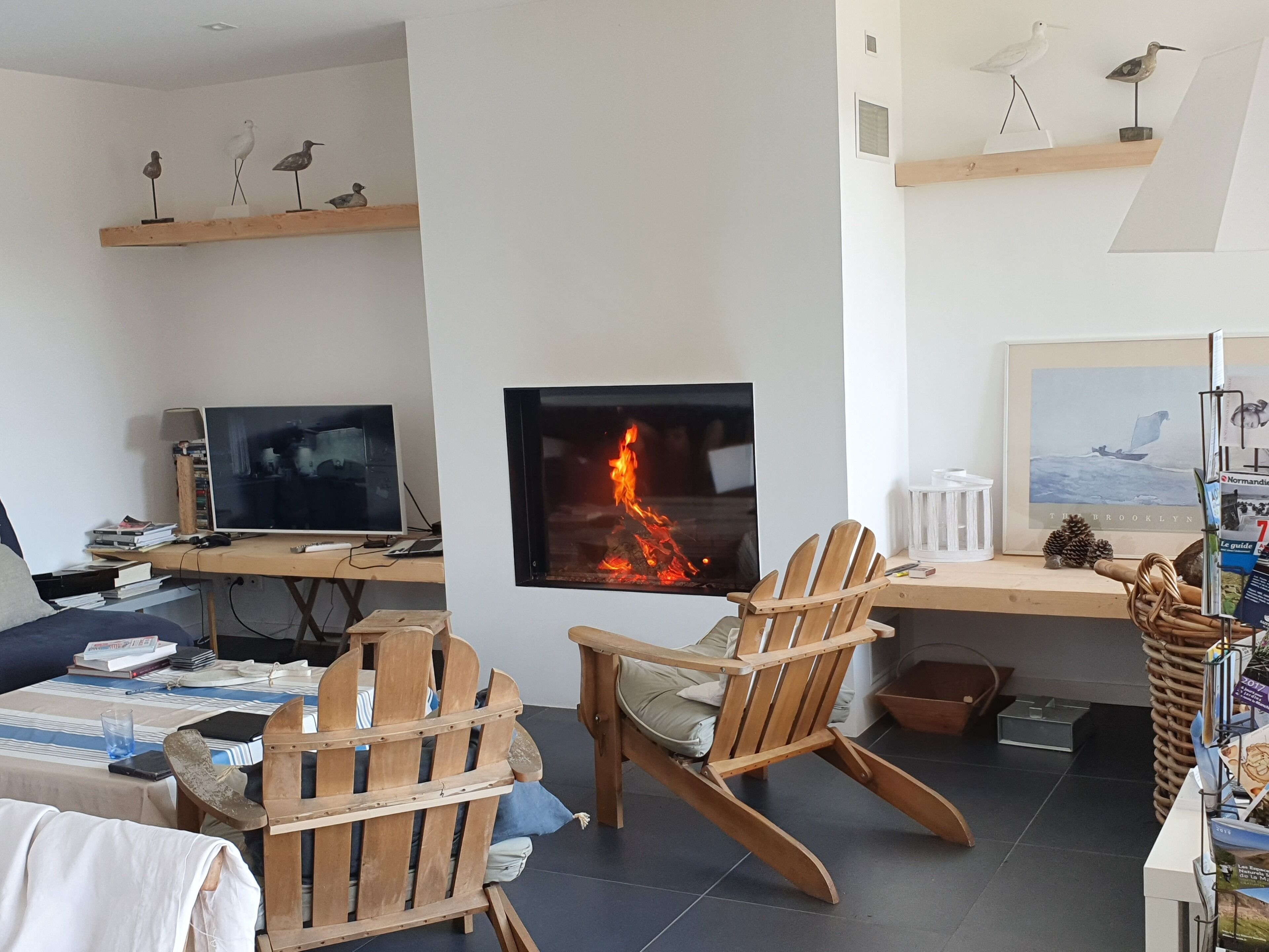 standing wooden house very close to beach