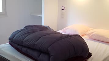 2 dormitorios, tabla de planchar con plancha, cuna de viaje y wifi
