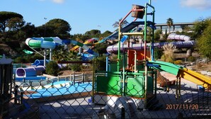 A water park with various slides and play structures. - Beau Mazet 75m2, large garden in pine forest, Private domain with Swimming pool, Tennis .. (Sainte-Maxime)