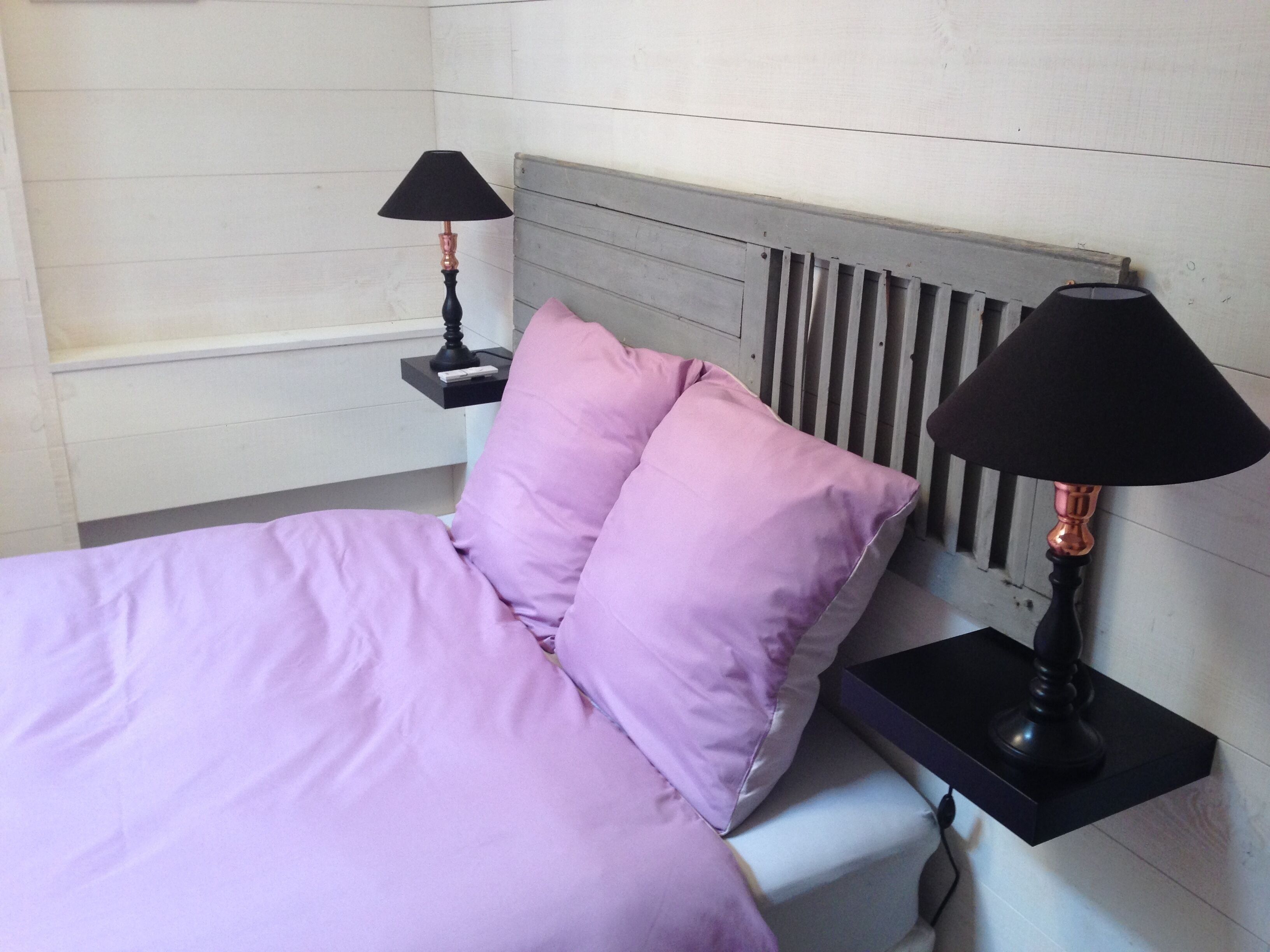 Johnson's house, feet in the water, a few grains of sand.