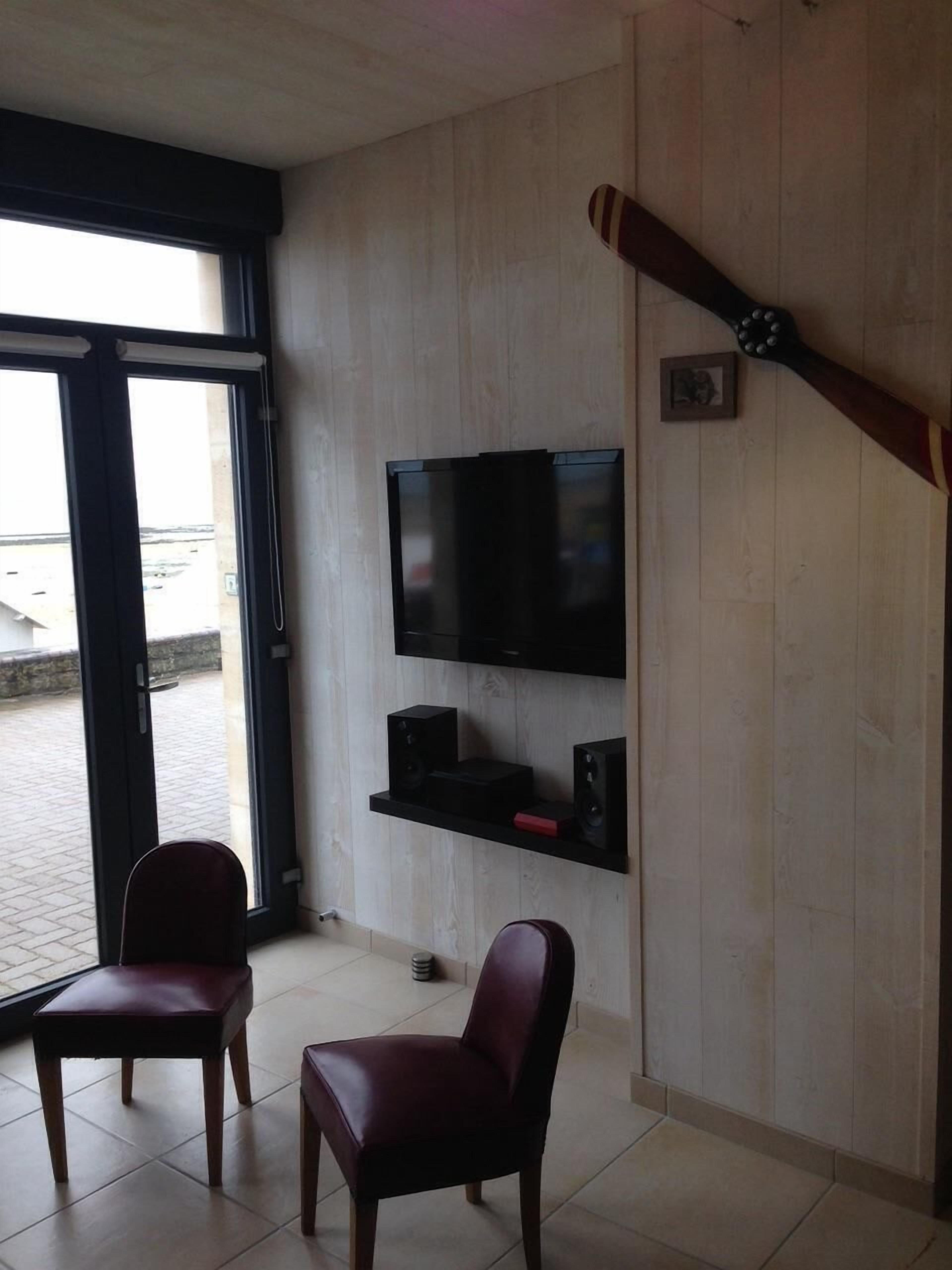 Johnson's house, feet in the water, a few grains of sand.