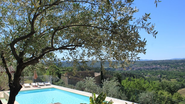 A swimming pool with a view of a rural landscape. - Furnished tourist accommodation 3 * south ardèche with shared pool (Rosières)