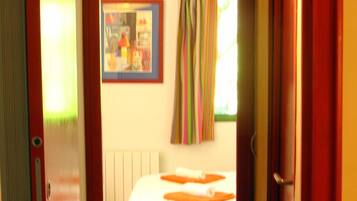 2 bedrooms, desk, iron/ironing board, travel cot