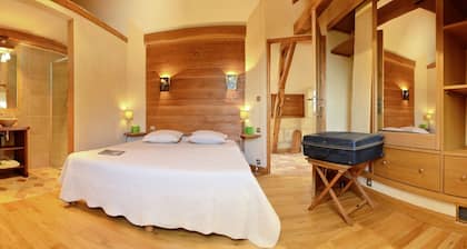 peaceful farmhouse surrounded by fields and woods, renovated comfort