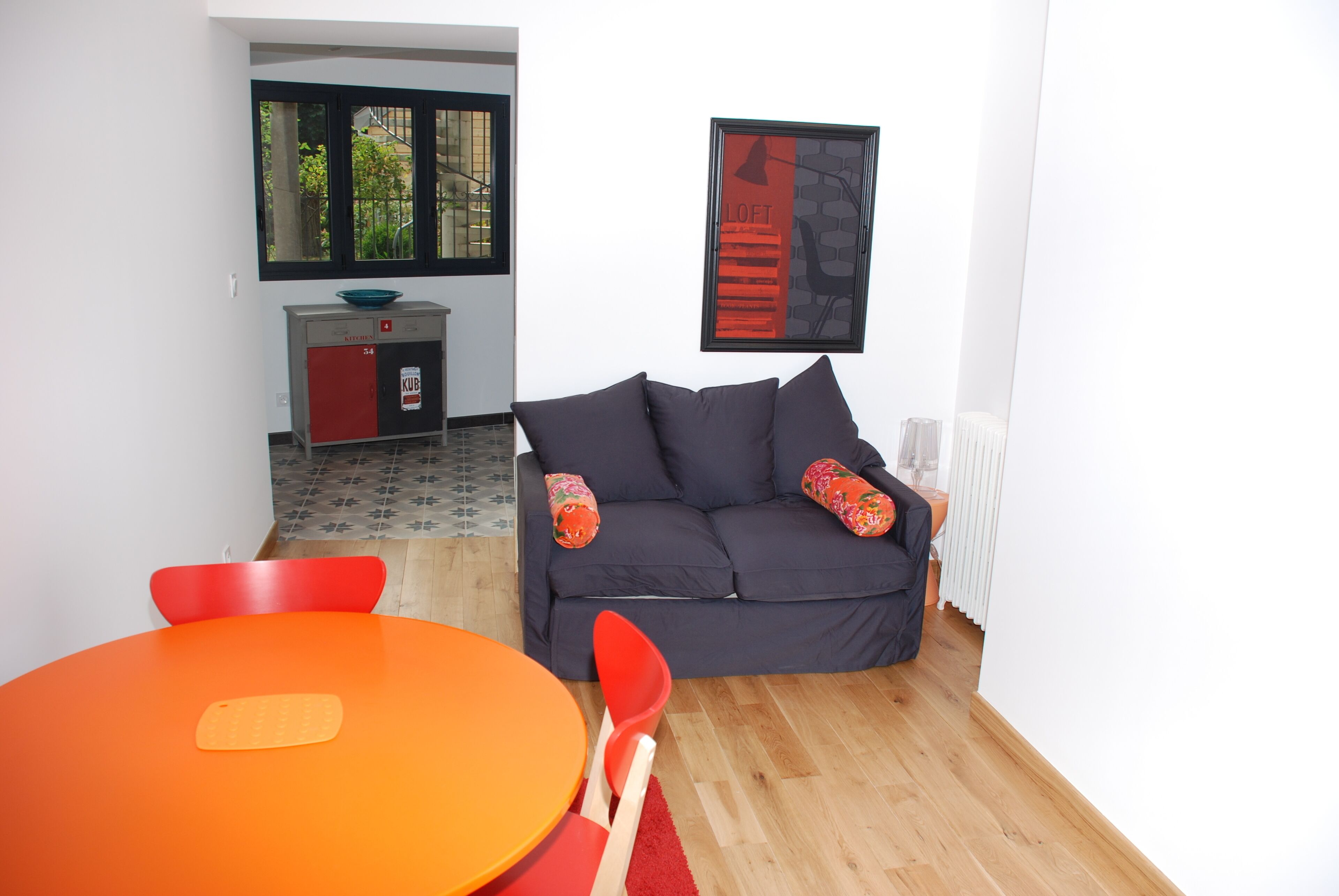 apartment on the ground floor of an 18th century building, pedestrian square