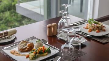 Daily cooked-to-order breakfast (USD 9 per person)