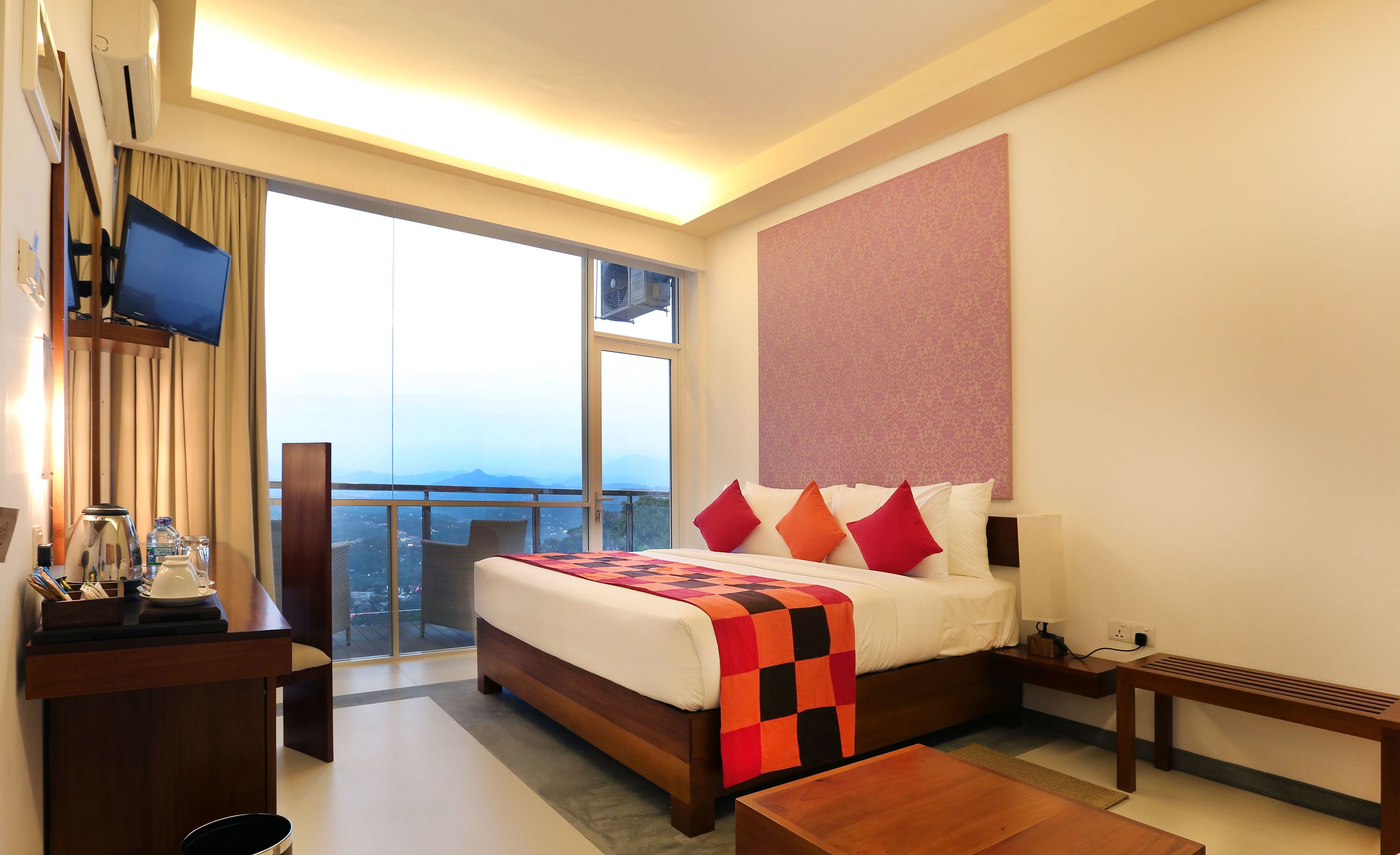 deluxe double room, 1 king bed, accessible, mountain view | 2 bedrooms, minibar, in-room safe, individually decorated