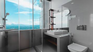 Suite Deluxe, 1 cama de matrimonio grande, no fumadores | Baño | Ducha y cabezal de ducha con hidromasaje