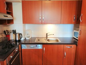 Fridge, microwave, coffee/tea maker, toaster