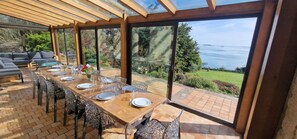 Dining - Beach view villa at the end of the garden covered swimming pool heated all year round (Lanmodez)