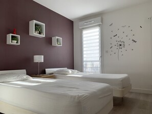 2 habitaciones, tabla de planchar con plancha, wifi y ropa de cama 