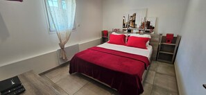 4 bedrooms, in-room safe, iron/ironing board, travel cot