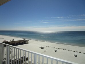 On the beach, sun-loungers