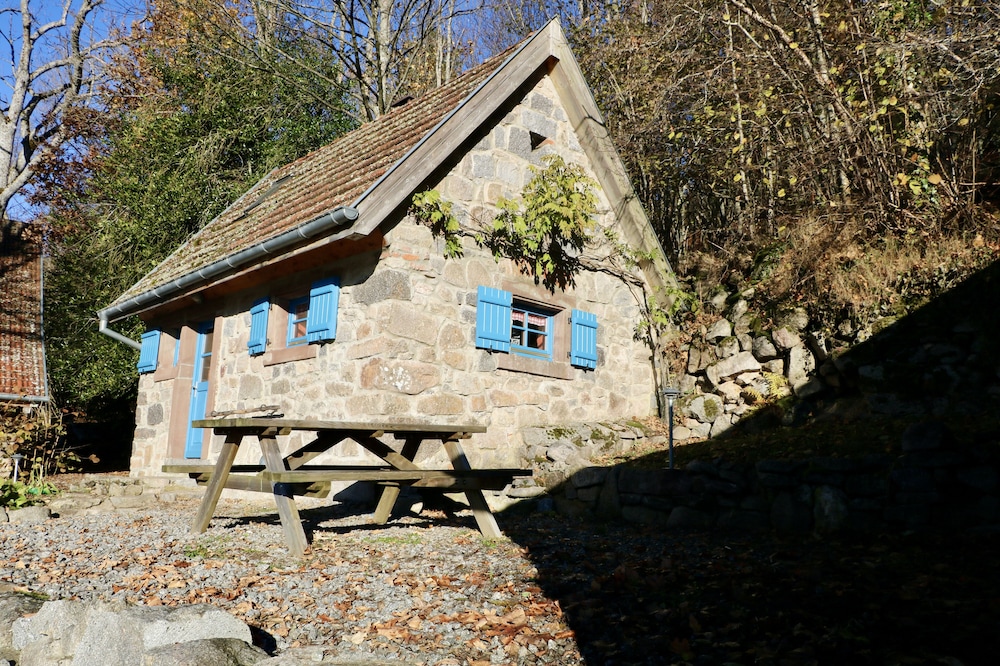 Old small renovate mountain cowshed, in rural environment